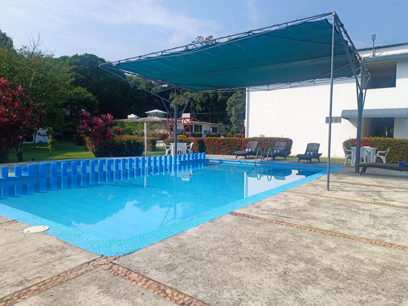 Hotel Los Leones Palenque Bagian luar foto